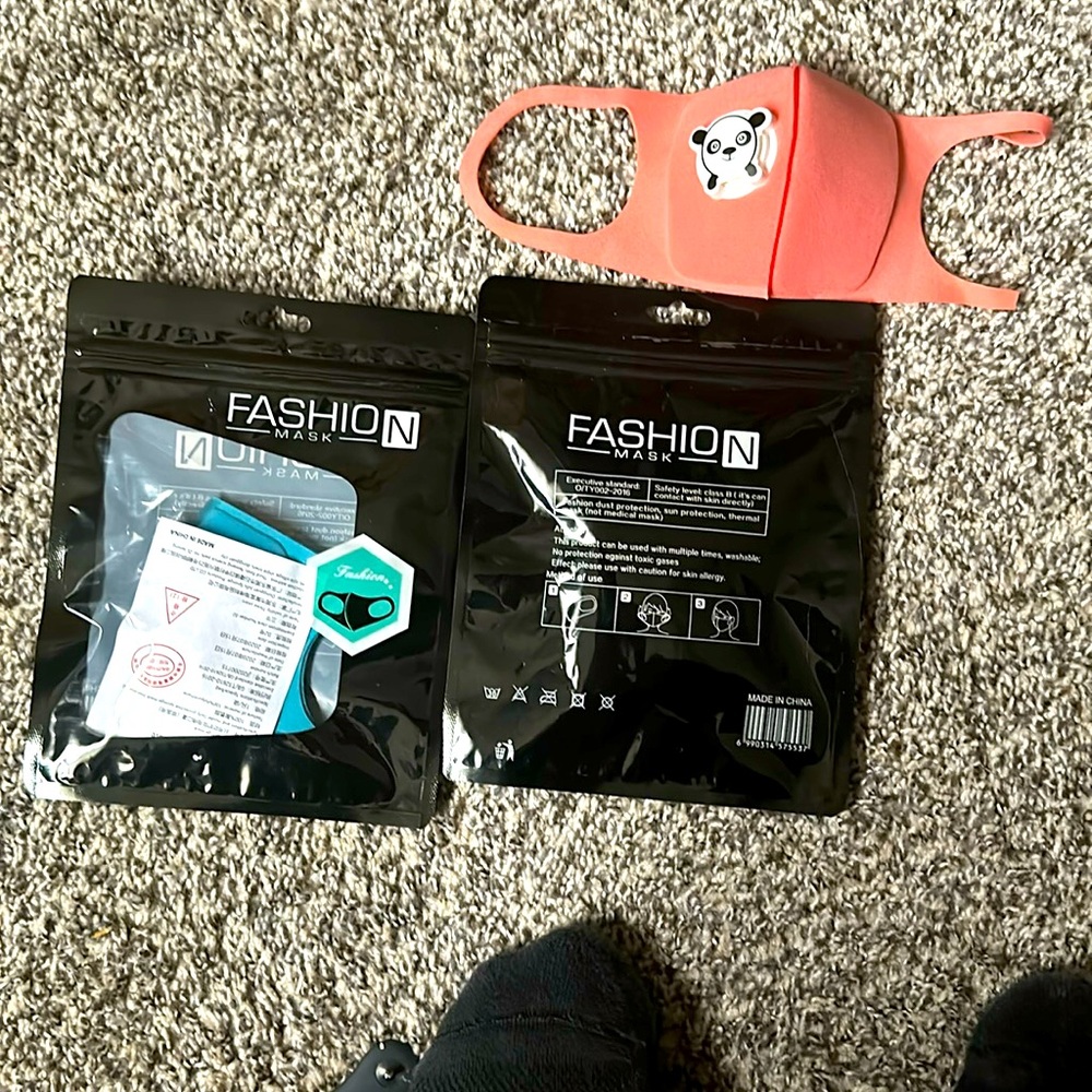 Colorful kids safety mask, with fun logos. All different colors. Covid approved